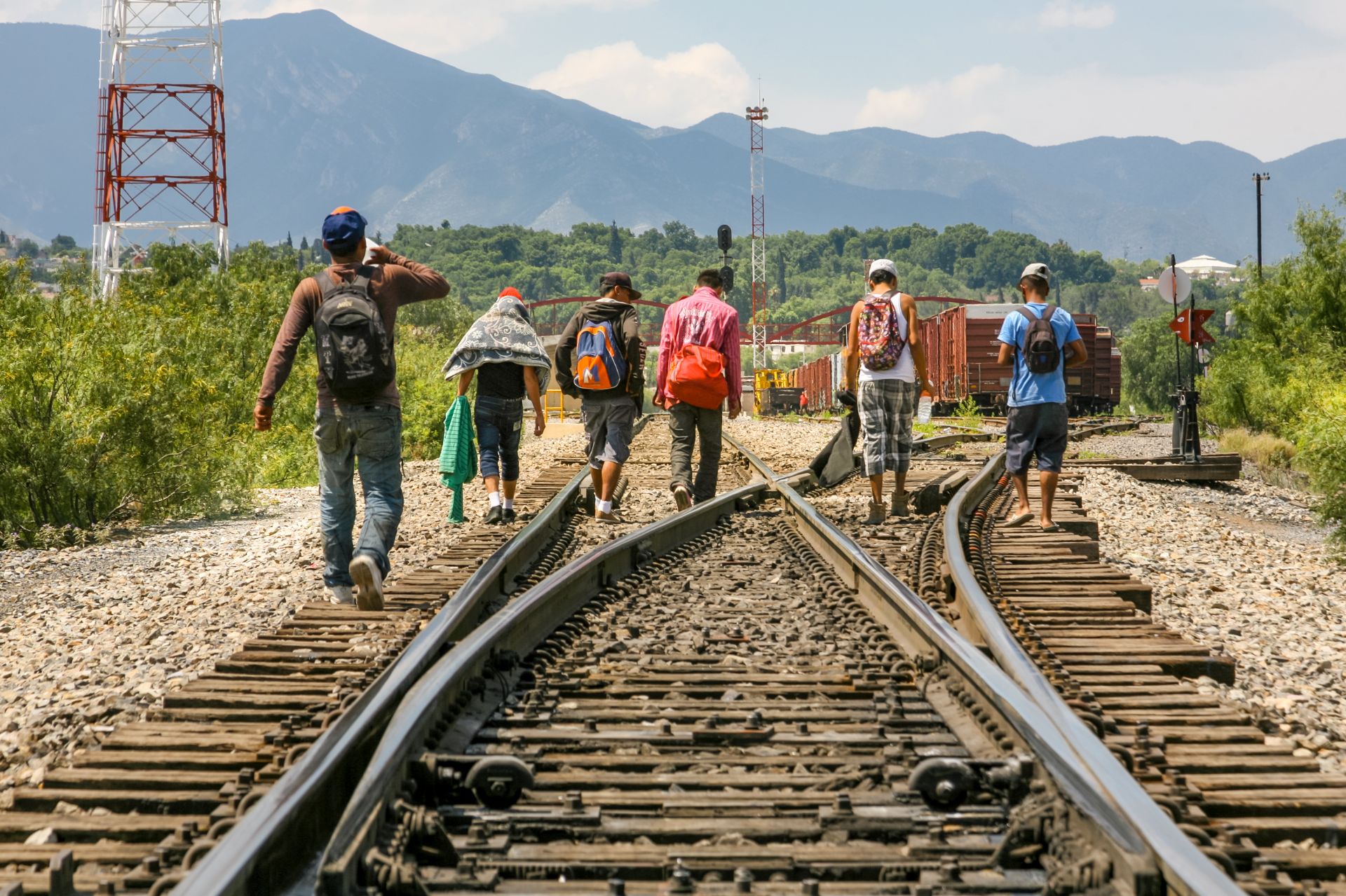 A Group Of Migrants Walk Along The Railroad Near The Usmexico Border In The State Of Coahuila In Northern Mexico
