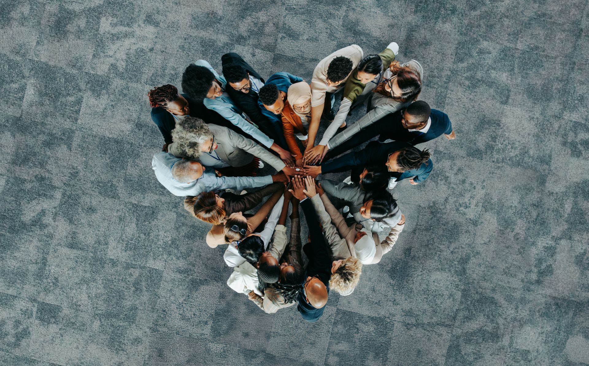 Top View Of A A Heart Shape Of People Showing Unity And Teamwork